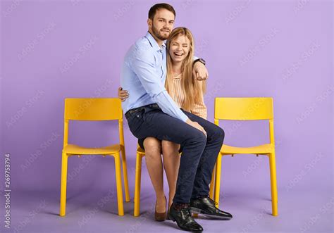 man sitting on woman|Man on womans lap hi.